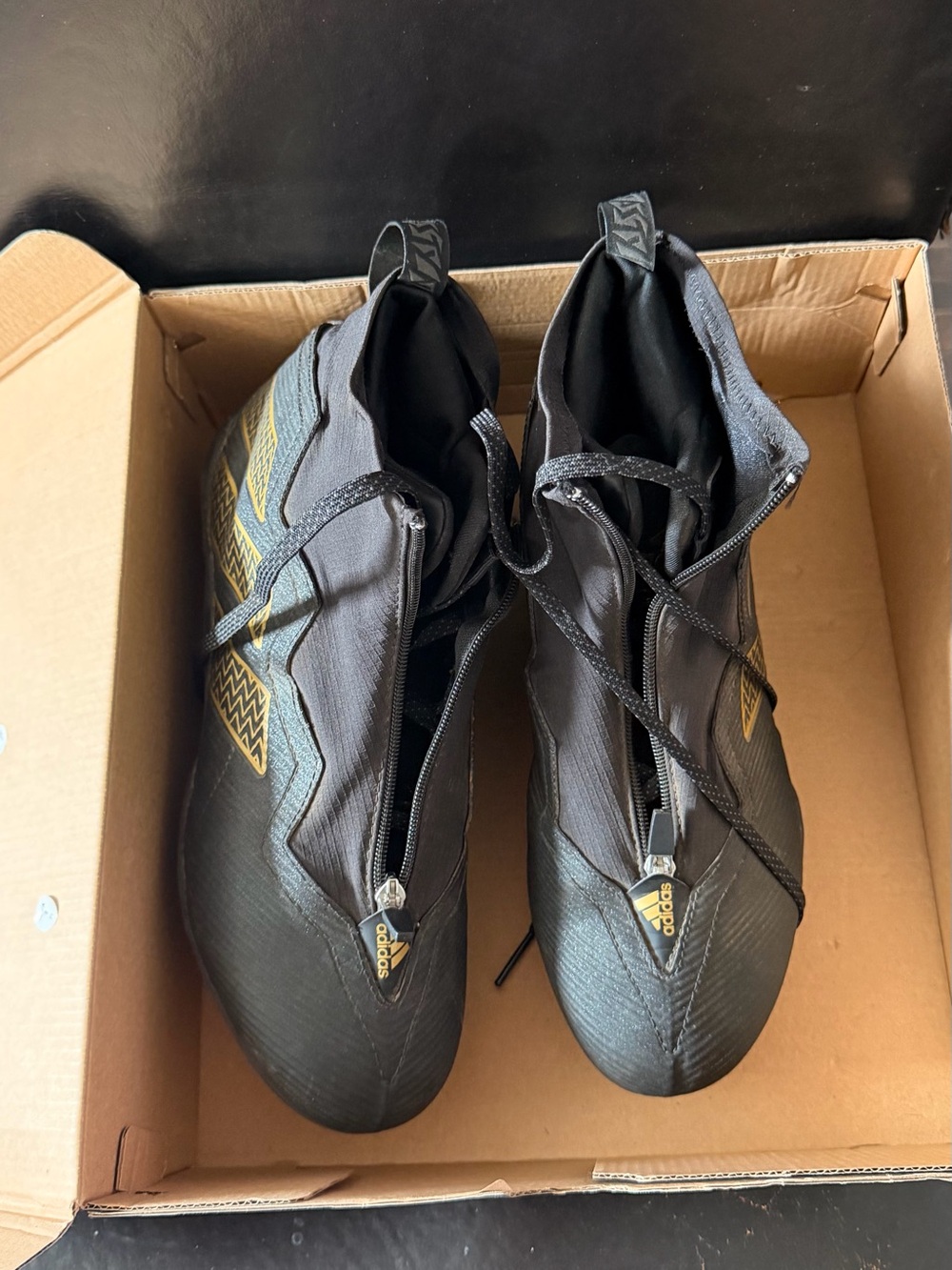 adidas Black with Gold Accent Men's Athletic Cleats